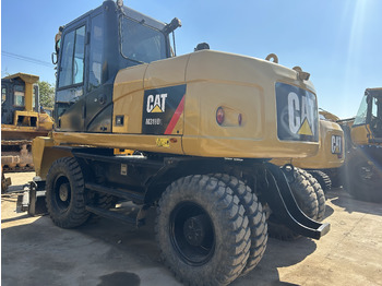 Escavadeira de rodas CATERPILLAR M318