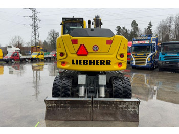 Locação de Liebherr 910 Compact Litronic Powertilt  Liebherr 910 Compact Litronic Powertilt: foto 5