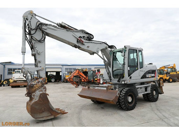 Escavadeira de rodas CATERPILLAR M313D