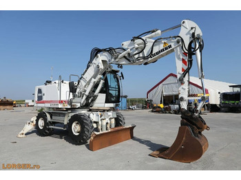 Escavadeira de rodas LIEBHERR A 914