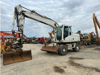 Escavadeira de rodas CATERPILLAR M316D