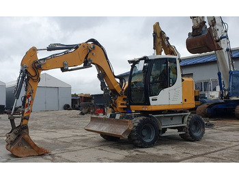 Escavadeira de rodas LIEBHERR A 910