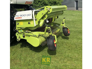 Máquina para produção de feno CLAAS